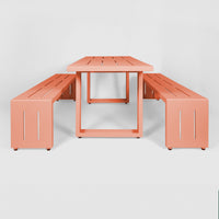 A salmon pink S.R. All Aluminum Table Set on a white background