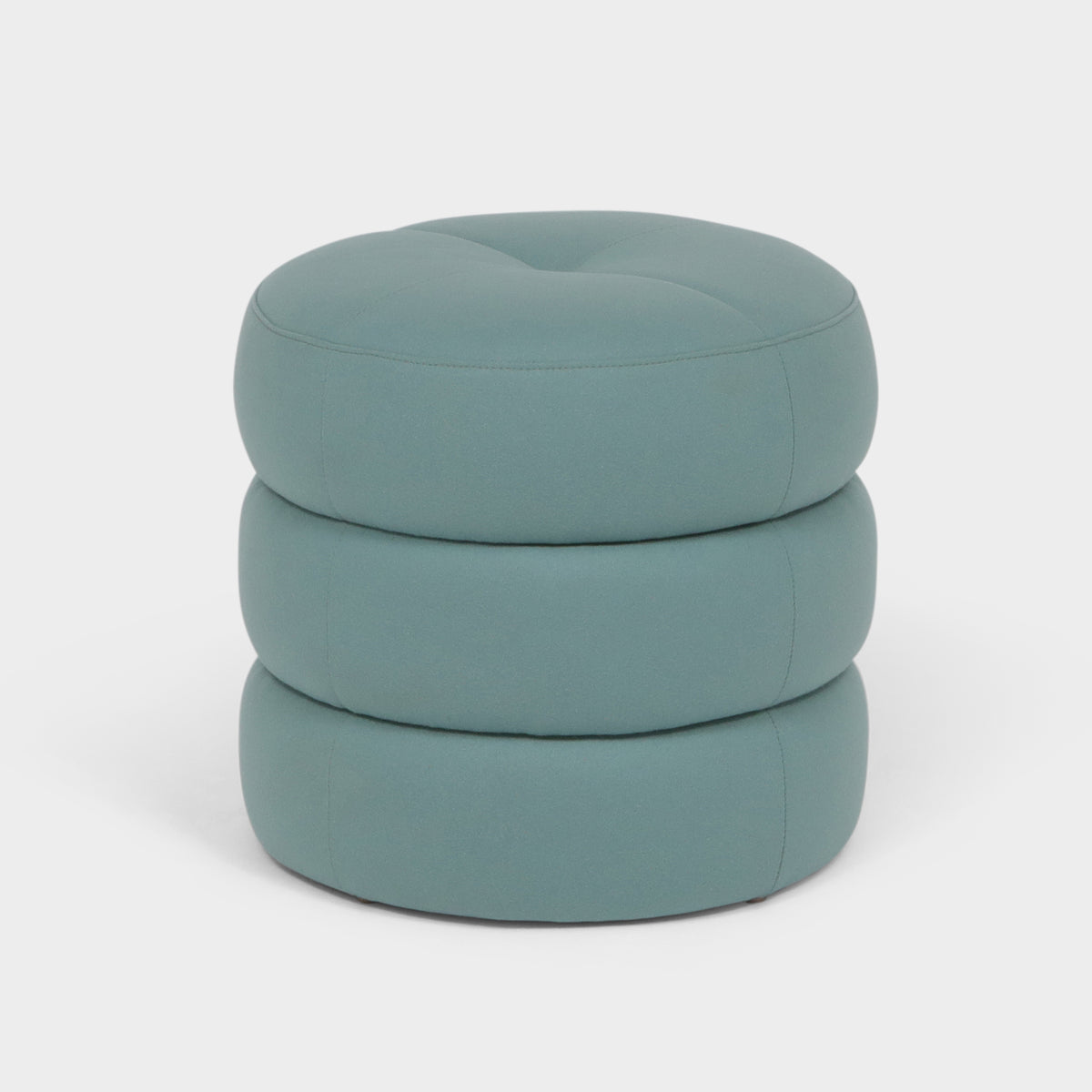 A light blue three layer S.R. pouf on a white background.